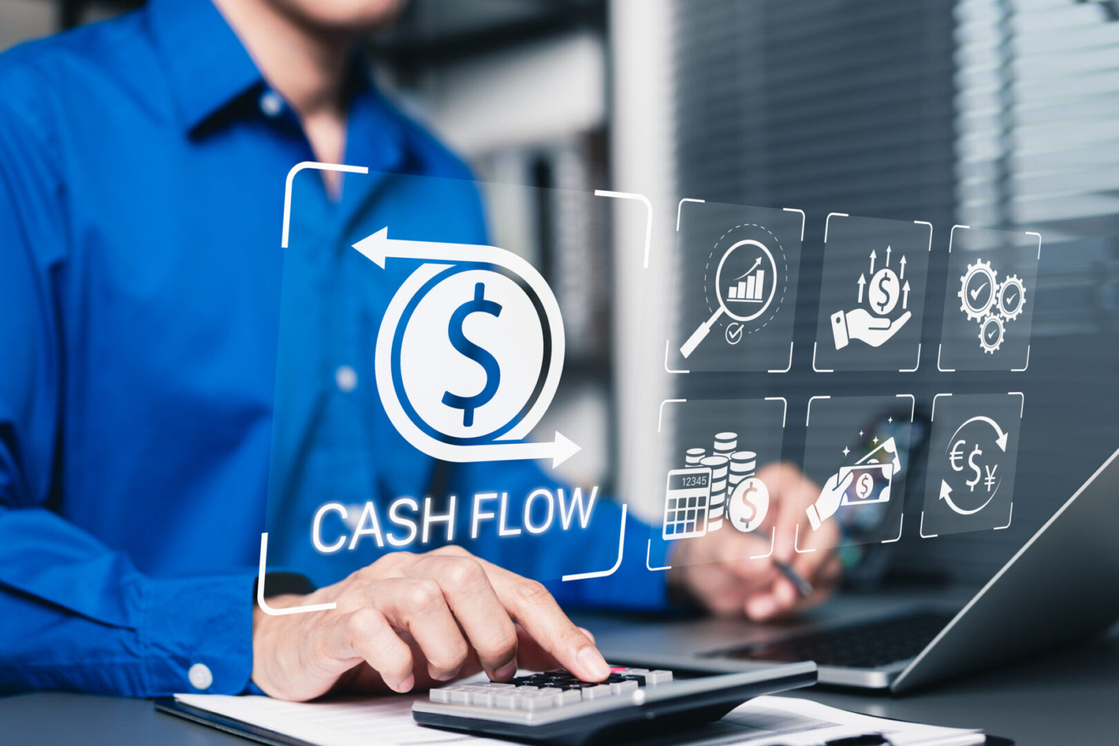 Businessman managing cash flow with digital financial icons.