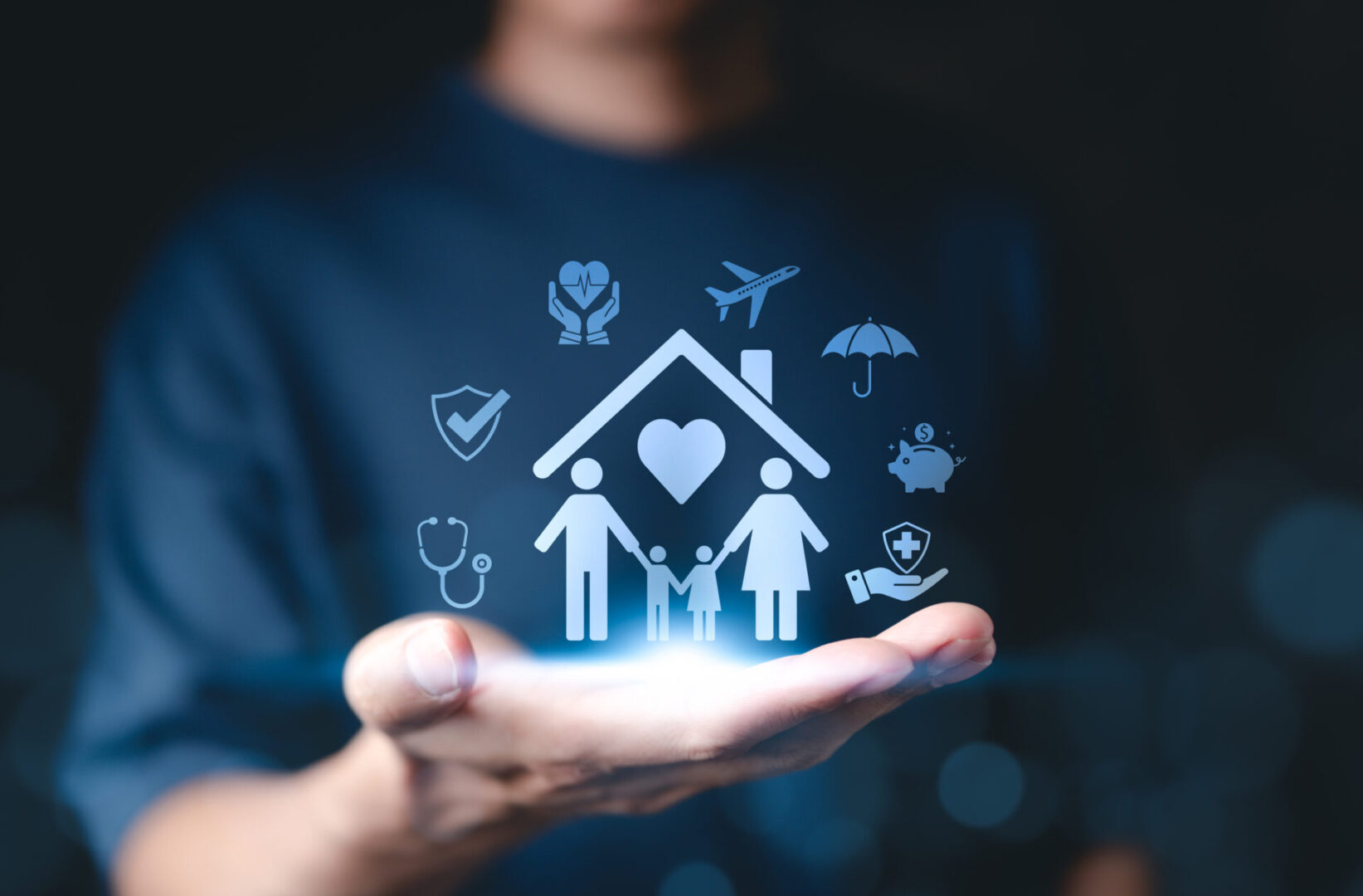 Hand holding icons representing home, family, and insurance protection.
