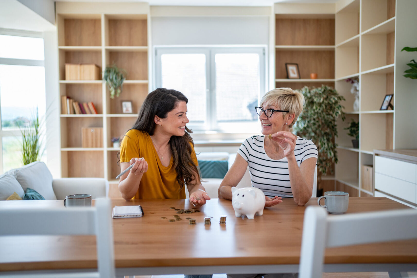 Two women enjoying a lively conversation while playing a game.
