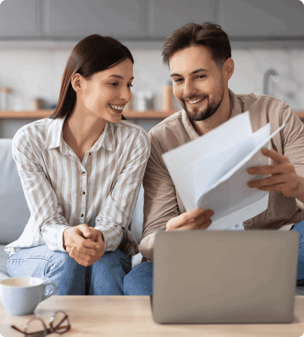 Happy partners working on finances